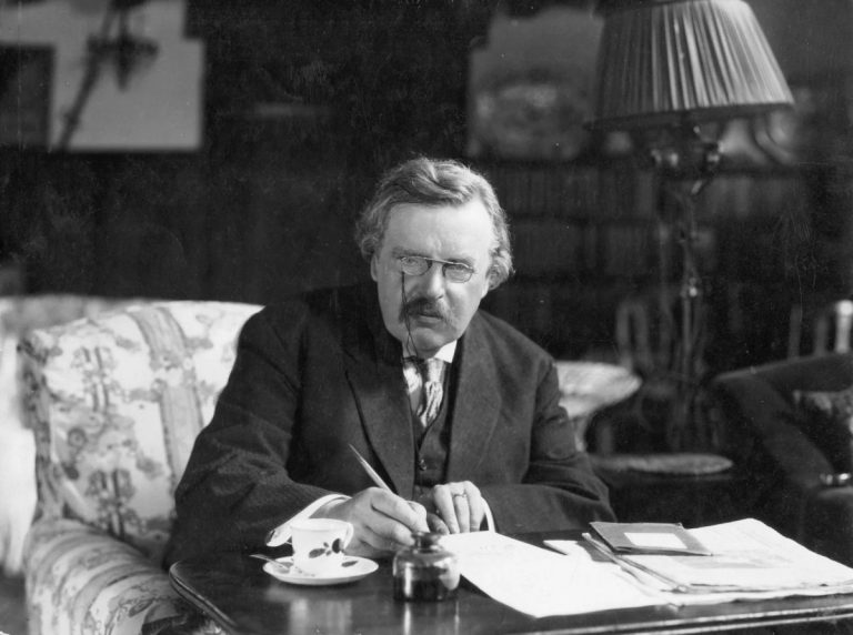 G. K. Chesterton At Work Public Domain Wikimedia Commons.jpg