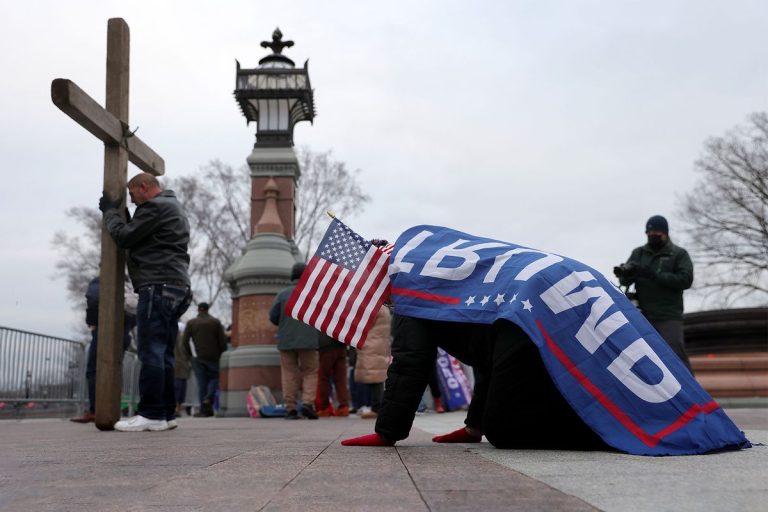 Trump Supporters Praying At Cross 1294873105.jpg